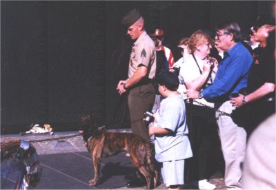 Marine at the Wall with his Dog